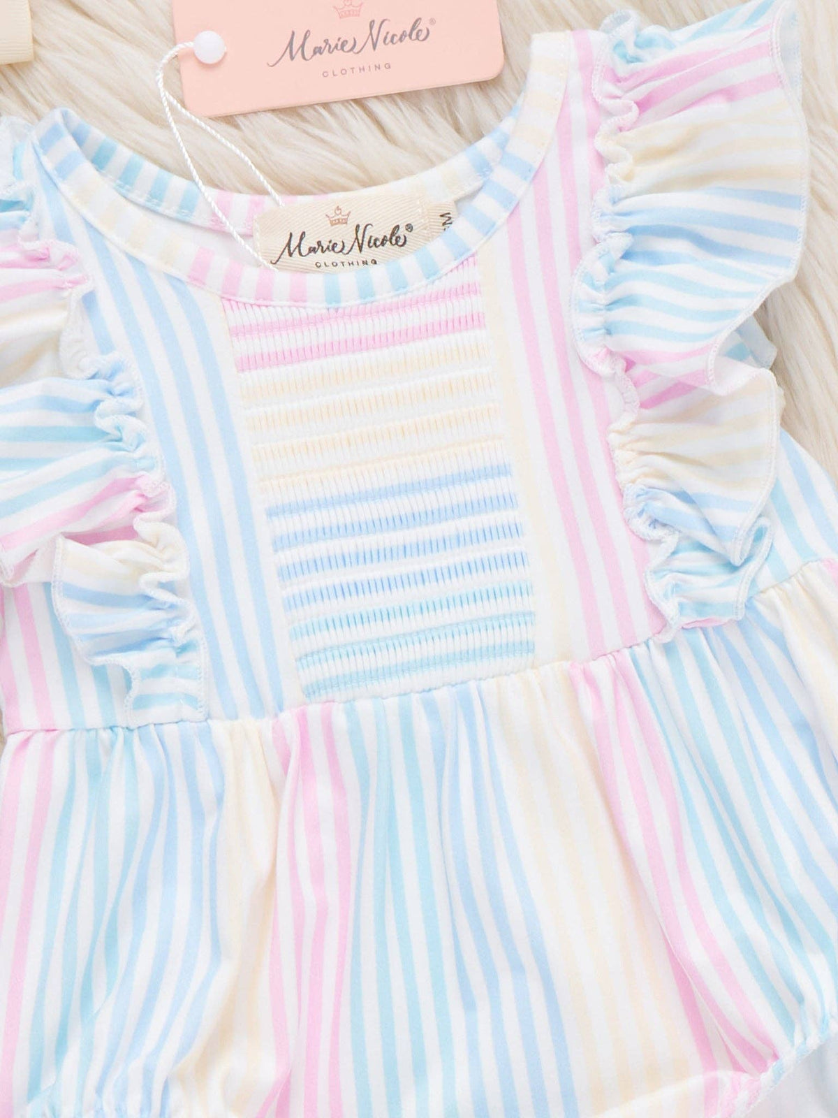 The Pastel Rainbow Ruffle Romper