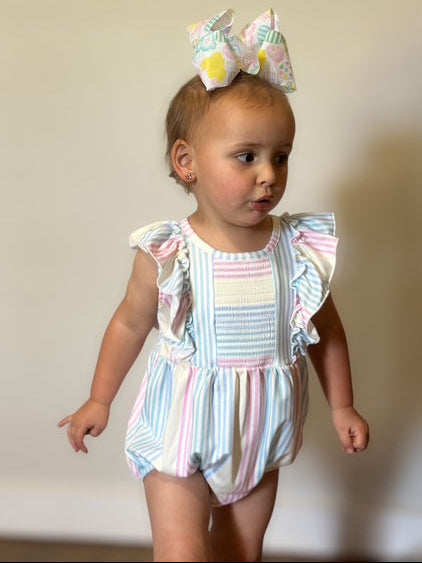 The Pastel Rainbow Ruffle Romper